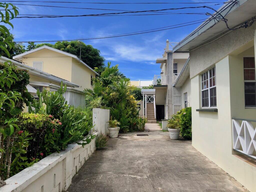 view of the front patio stairs at a 1 bedroom 1 bathroom apartment. Worthing long-term rentals Barbados 